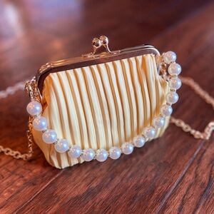 Elegant Pleated Yellow Clutch with Pearl Strap